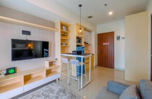 Pekayon Jaya Apartment | Cozy and Great Choice Studio at Grand Kamala Lagoon Apartment By Travelio