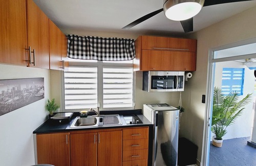 Puerto Nuevo Apartment | Cozy and Modern Apartment Black & White with Jacuzzi on Terrace