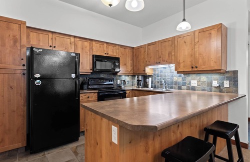 Sun Peaks Condo | Cozy and Quiet 2 bedroom ski in/ski out condo with private HOT TUB
