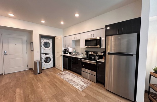 Central Tacoma Apartment | Cozy apartment with Rooftop views, home workspace and close to Hospitals!