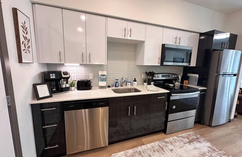 Central Tacoma Apartment | Cozy apartment with Rooftop views, home workspace and close to Hospitals!