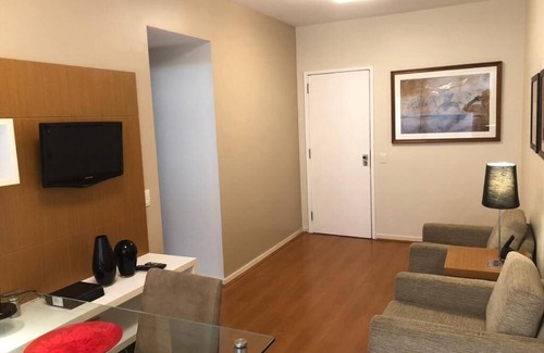 Leblon Apartment | Cozy bedroom and living room with balcony in Leblon.