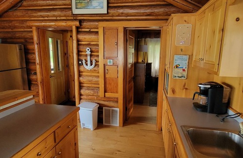 Arbor Vitae Cabin | Cozy boat house on the lake! Private dock and beautiful water views!
