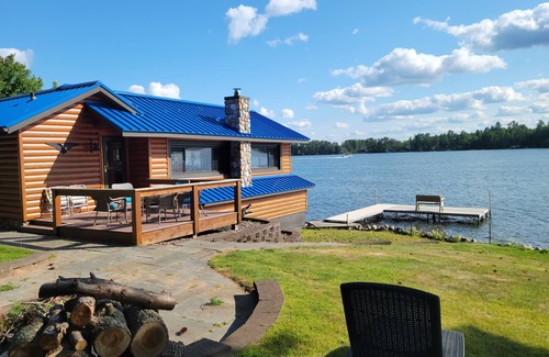 Arbor Vitae Cabin | Cozy boat house on the lake! Private dock and beautiful water views!