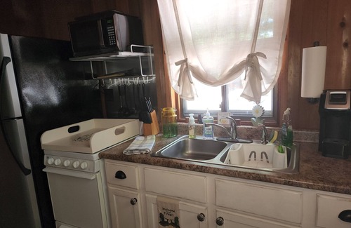 Bellmore Cabin | Cozy Cabin- A-Frame style cabin with Loft.