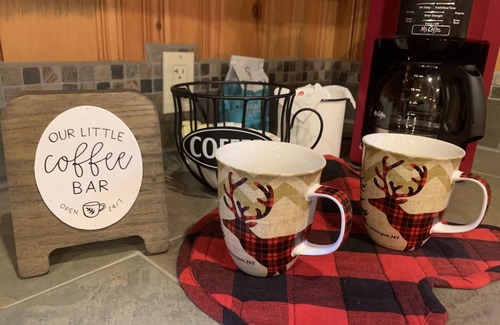 Woodruff Cottage | Cozy cabin gas fire place heated floors perfect for snowmobiling on trail 51