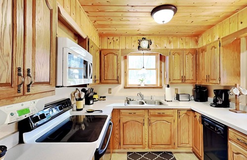 Oakland House | Cozy Cabin | Hot Tub, Fire Pit, Game Room