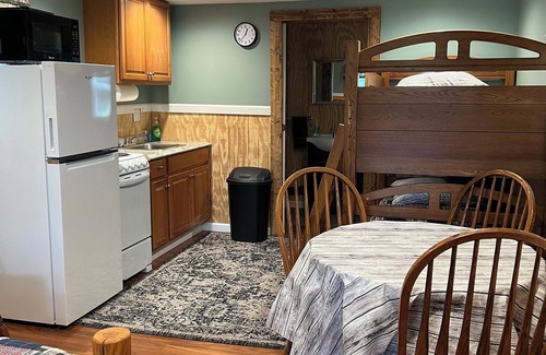 Lake Cabin | Cozy cabin in the woods on our own private lake with WIFI, A/C & Heat.