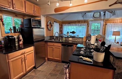 Elcho Cabin | Cozy cabin just steps away from Upper Post Lake. Pet friendly with a small fee!