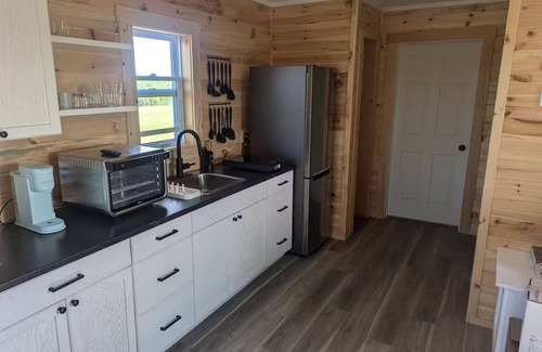 Onslow Cabin | Cozy Cabin overlooking rolling fields, goats, chickens, ducks, and more,