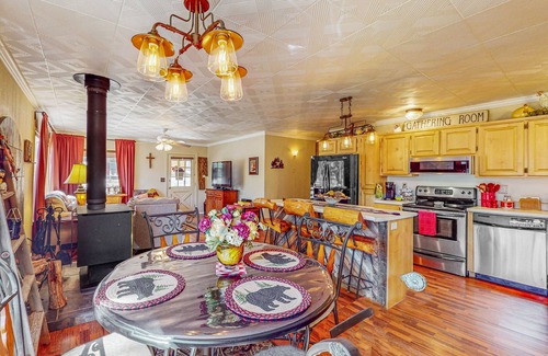 Overgaard Cabin | Cozy cabin with fireplace, farmers porch, central AC & close to trails!