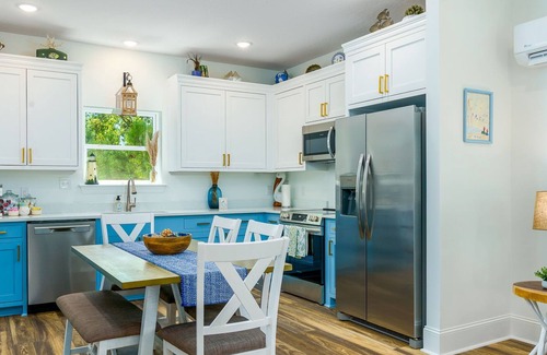 Henderson Point House | Cozy Coastal Cottage w/ dock, boat launch and a pool!!