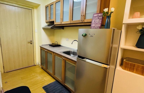 Ususan Condo | Cozy condo in enjoyable Taguig with WiFi, AC