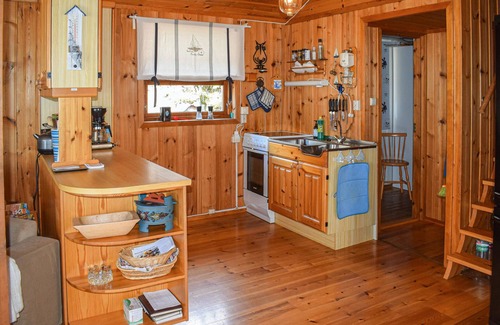 Stokke House | Cozy cottage with wood-burning stove and panoramic view of the fjord.