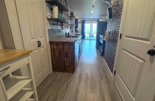 Eagle Bay Apartment | Cozy Country Retreat at the Baker Ranch with hot tub. Pet friendly. Lake view.