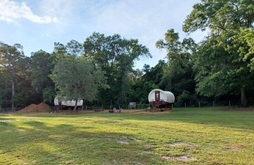 Putnam Hall Cabin | Cozy Covered Family Wagon on Rooterville’s Working Farm and Animal Sanctuary