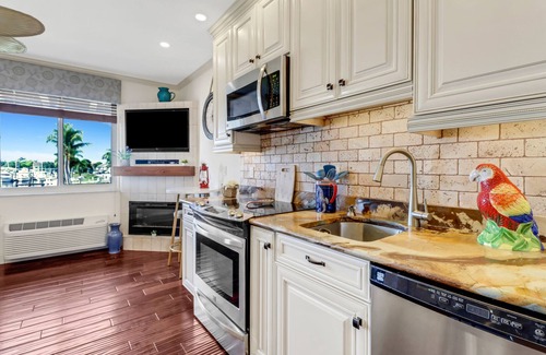Naples Resort | Cozy Designer Studio with Water views of Marina in Port of The Islands Naples!