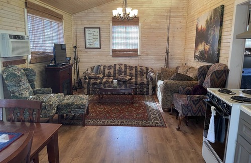 Pangburn Cabin | Cozy family fish camp on the Little Red River, a premier trout fishing stream!
