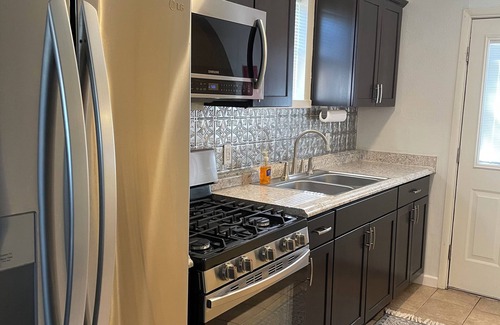 Dunbar House | Cozy home conveniently located and backs up to greenspace. Dog-Friendly!