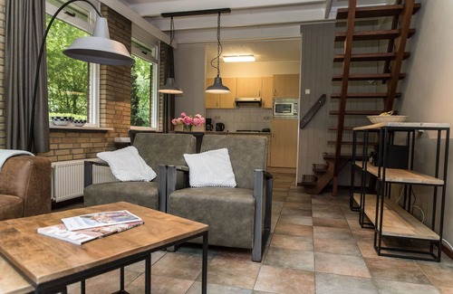 Bisselt House | Cozy house with a fireplace in a holiday park in a natural area
