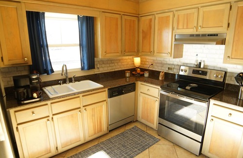 Town Creek Cabin | Cozy Lakeside Cabin w/Private Doc, Pool, & Screened In Porch!