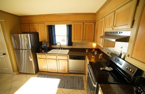 Town Creek Cabin | Cozy Lakeside Cabin w/Private Doc, Pool, & Screened In Porch!