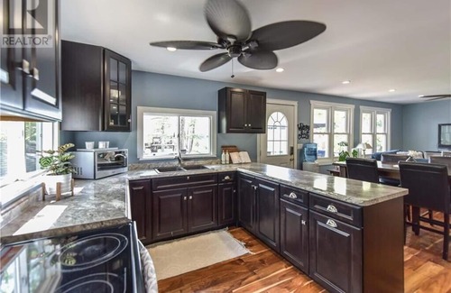 Severn Cottage | Cozy Lakeside Cottage Retreat with Kayaks, Paddle Boat & Sunset Waterfront Views