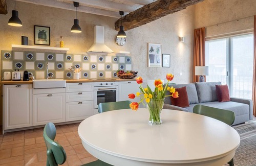 Cressa Apartment | Cozy Loft Apartment in Restored Farmhouse