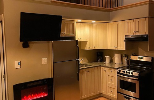 Lac Le Jeune Cabin | Cozy log cabin retreat with modern amenities