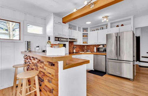 Loring Heights House | Cozy Midtown retreat with skyline views, private yard, deck, firepit, & W/D