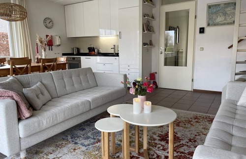 Langweer House | Cozy, modernly furnished holiday home with a nice terrace and a jetty