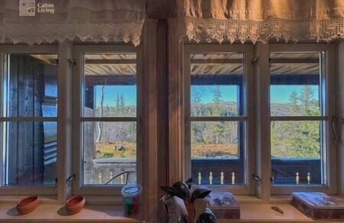 Fla Municipality House | Cozy mountain cabin with sauna, fireplace & bbq