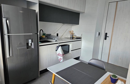 La Carolina Apartment | Cozy new studio in Harmony Building with incredible communal areas.