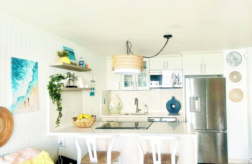 Punaluu Apartment | Cozy oceanfront 1-bedroom condo with WiFi, and access to sandy beach.