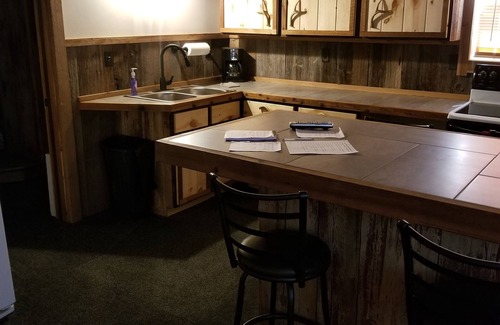 Walhalla Cabin | Cozy, open concept barnwood cabin with pool table & shuffleboard near PM river!