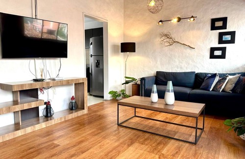 Astorga Apartment | Cozy Penthouse next to Poblado Park with Large Balcony and A/C