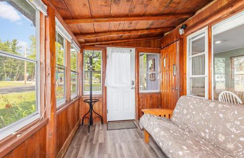 Newaygo Apartment | Cozy pet-friendly cabin with dock, firepit, bikes, BBQ