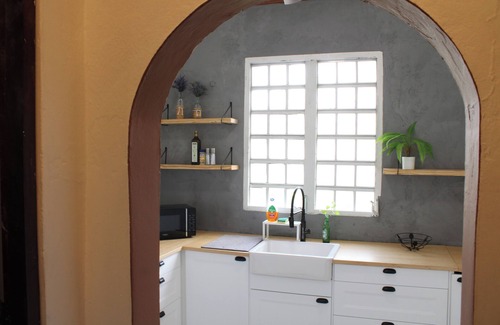 Isla Grande Apartment | Cozy San Juan Boho Retreat - King Size Bed, Fast internet, AC, 4 smart tvs!