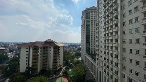 Permata Hijau Apartment | Cozy Stay and Tidy 1BR at The Bellezza Apartment By Travelio