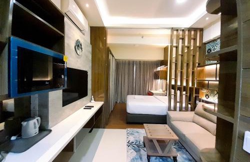Catur Tunggal Apartment | Cozy Studio Room at Uttara The Icon Apartment By Travelio