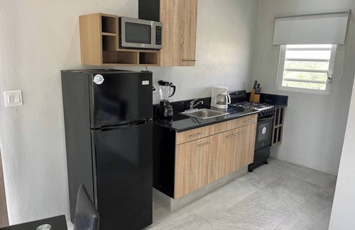 The Valley Apartment | Cozy studio with WiFi and AC in charming The Valley, Black Garden