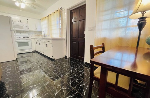 Estate Marys Fancy House | Cozy tropical retreat minutes from dining shopping and the beach!