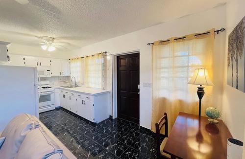Estate Marys Fancy House | Cozy tropical retreat minutes from dining shopping and the beach!
