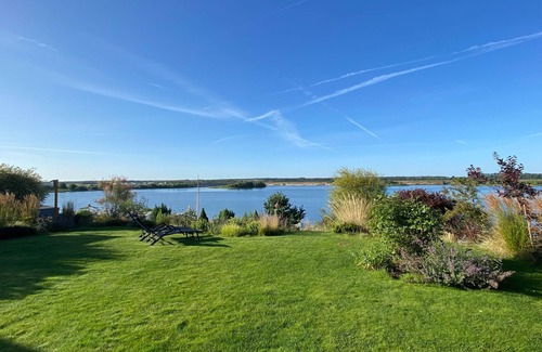 Lobnitz House | Cozy vacation home on the beautiful Mühlfeldsee with private beach, sauna and fireplace