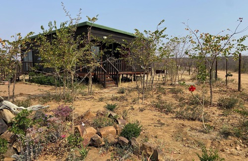 Palapye Cabin | Cozy wooden cabin overlooking the foot of the Tswapong Hills in Palapye.
