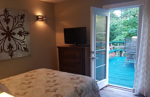 Balm Beach House | Creek Chalet at Balm Beach with Hot Tub & Sauna