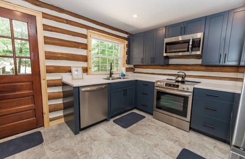 Caldwell Cabin | Creek side Log Cabin with hot tub in White Sulphur Springs WV