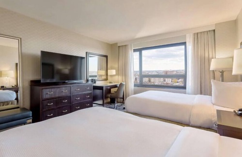 Dupont Circle Hotel | Culture and Comfort! 2 Spacious Units, Swimming Pool, Pets Allowed!