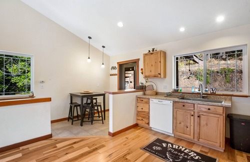 Ronald House | Custom home with balcony, radiant floor heating & washer/dryer