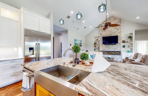 Waller House | Custom Home with Guesthouse, Pond, Swimming Deck, Beach & Tropical Bar